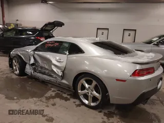 2014 Chevrolet Camaro LT z VIN 2G1FC1E31E9281774, wystawiony jako IAAI lot #41362956 z przebiegiem 144 936 mil mil oraz . Historia ofert i sprzedaży dostępna na DreamBid. Obrazek 3.