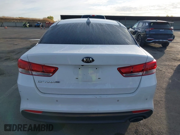 2016 Kia Optima LX with VIN 5XXGT4L34GG062691, listed as a IAAI auction lot 40743940 with 99,069 mi miles and . Bid and sale history available at DreamBid. Image 16.