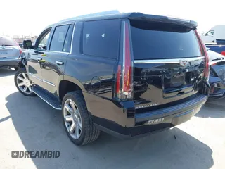 2020 Cadillac Escalade Luxury with VIN 1GYS3BKJ0LR129965, listed as a IAAI auction lot 42084752 with 133,390 mi miles and . Bid and sale history available at DreamBid. Image 3.