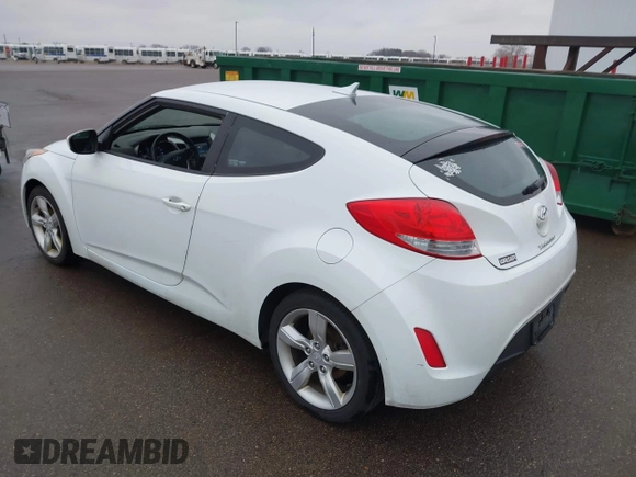 2013 Hyundai Veloster w/Gray Int with VIN KMHTC6AD8DU171050, listed as a IAAI auction lot 41992468 with 186,714 mi miles and . Bid and sale history available at DreamBid. Image 3.