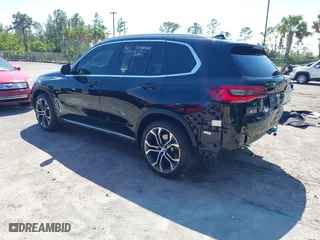 2023 BMW X5 sDrive40i with VIN 5UXCR4C07P9P72263, listed as a IAAI auction lot 41884954 with 34,233 mi miles. Bid and sale history available at carsss.com. Image 3.