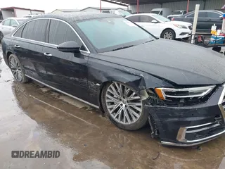 2019 Audi A8 L with VIN WAU8DAF82KN004676, listed as a IAAI auction lot 41086272 with 58,217 mi miles. Bid and sale history available at carsss.com. Image 6.
