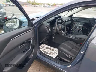 2024 Mazda CX-50 S Select with VIN 7MMVABAM9RN203355, listed as a IAAI auction lot 40399675 with 5,415 mi miles and . Bid and sale history available at DreamBid. Image 5.