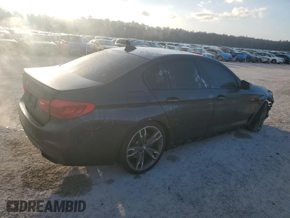 2019 BMW 5 Series M550i xDrive with VIN WBAJB9C57KB288906, listed as a Copart auction lot 79846274 with 61,744 mi miles and Salvage title. Bid and sale history available at DreamBid. Image 3.