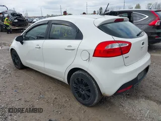 2012 Kia Rio EX with VIN KNADN5A31C6041521, listed as a IAAI auction lot 41994678 with 142,229 mi miles. Bid and sale history available at carsss.com. Image 3.
