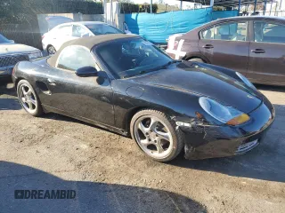 2000 Porsche Boxster z VIN WP0CA2983YU621686, wystawiony jako Copart lot #88951585 z przebiegiem 127 276 mil mil oraz Tytuł czysty. Historia ofert i sprzedaży dostępna na DreamBid. Obrazek 4.