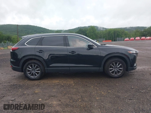 2020 Mazda CX-9 Touring with VIN JM3TCBCY5L0422262, listed as a IAAI auction lot 42456246 with 69,211 mi miles and . Bid and sale history available at DreamBid. Image 13.