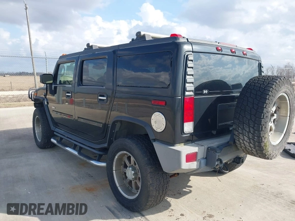 2006 Hummer H2 with VIN 5GRGN23U66H120601, listed as a IAAI auction lot 41524634 with 155,003 mi miles. Bid and sale history available at carsss.com. Image 3.
