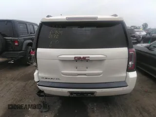 2015 GMC Yukon XL SLT with VIN 1GKS2HKC1FR120133, listed as a IAAI auction lot 39693190 with 211,652 mi miles. Bid and sale history available at carsss.com. Image 16.