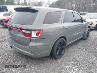 2021 Dodge Durango GT Plus with VIN 1C4RDHDG8MC639748, listed as a IAAI auction lot 41623021 with 104,686 mi miles and . Bid and sale history available at DreamBid. Image 4.