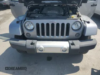 2015 Jeep Wrangler Sahara with VIN 1C4AJWBG1FL705900, listed as a Copart auction lot 62353275 with 64,866 mi miles and Salvage title. Bid and sale history available at DreamBid. Image 11.
