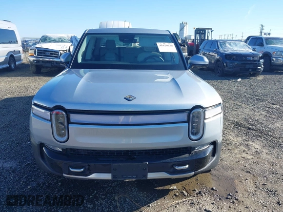 2023 Rivian R1T Adventure with VIN 7FCTGAAA0PN021864, listed as a IAAI auction lot 41620630 with 1 mi miles. Bid and sale history available at carsss.com. Image 12.