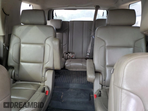 2015 Chevrolet Tahoe LTZ with VIN 1GNSKCKC1FR310018, listed as a Copart auction lot 71798454 with 244,179 mi miles and Salvage title. Bid and sale history available at DreamBid. Image 10.