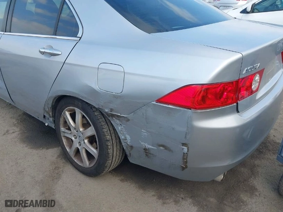 2005 Acura TSX with VIN JH4CL96995C022954, listed as a IAAI auction lot 41412294 with NaN miles. Bid and sale history available at carsss.com. Image 6.
