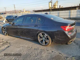 2017 BMW 7 Series 750i with VIN WBA7F0C57HGM21136, listed as a Copart auction lot 88525335 with 102,508 mi miles and Salvage title. Bid and sale history available at DreamBid. Image 2.