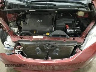 2015 Toyota Sienna LE AAS с VIN 5TDKK3DC2FS677288, выставлен на аукционе Copart как лот 57882845 с пробегом 162 458 миль миль и Списание • Salvage title. История ставок и продаж доступна на DreamBid. Изображение 12.
