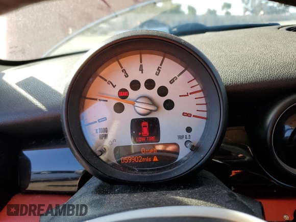 2011 MINI Hardtop with VIN WMWSU3C58BT183765, listed as a Copart auction lot 63061405 with 59,902 mi miles and Salvage title. Bid and sale history available at DreamBid. Image 9.