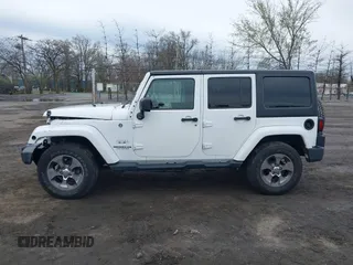 2017 Jeep Wrangler Unlimited Sahara z VIN 1C4BJWEG2HL695672, wystawiony jako IAAI lot #42008396 z przebiegiem 56 028 mil mil oraz . Historia ofert i sprzedaży dostępna na DreamBid. Obrazek 14.