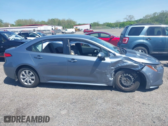 2023 Toyota Corolla LE z VIN JTDB4MEE7PJ002731, wystawiony jako IAAI lot #42155242 z przebiegiem 53 394 mil mil oraz . Historia ofert i sprzedaży dostępna na DreamBid. Obrazek 13.