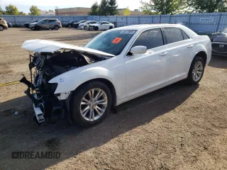 2016 Chrysler 300 Anniversary Edition z VIN 2C3CCAAG5GH161086, wystawiony jako Copart lot #69373003 z przebiegiem Nie podano mil oraz Szkody całkowita. Historia ofert i sprzedaży dostępna na DreamBid. Obrazek 1.