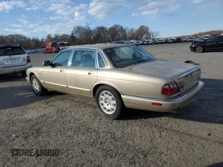 1998 Jaguar XJ with VIN SAJHX1248WC853422, listed as a Copart auction lot 80614724 with 76,269 mi miles and Non repairable. Bid and sale history available at DreamBid. Image 2.