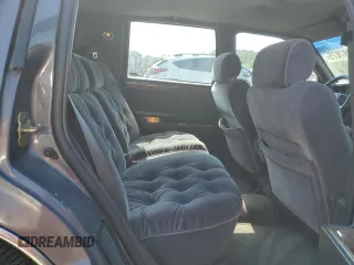 1993 Chrysler New Yorker z VIN 1C3XC66R8PD205488, wystawiony jako Copart lot #59097875 z przebiegiem 70 593 mil mil oraz Czysty tytuł • Clean title. Historia ofert i sprzedaży dostępna na DreamBid. Obrazek 10.