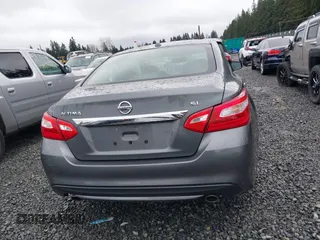 2017 Nissan Altima SV with VIN 1N4AL3AP3HC489387, listed as a IAAI auction lot 41665718 with 65,873 mi miles and . Bid and sale history available at DreamBid. Image 16.