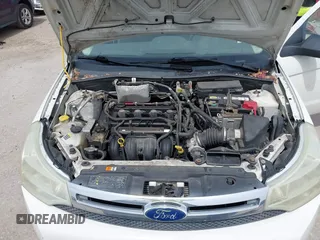 2010 Ford Focus S z VIN 1FAHP3ENXAW277313, wystawiony jako IAAI lot #42353466 z przebiegiem 210 620 mil mil oraz . Historia ofert i sprzedaży dostępna na DreamBid. Obrazek 10.