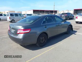 2010 Toyota Camry with VIN 4T1BF3EK2AU092057, listed as a IAAI auction lot 41907435 with 182,197 mi miles and . Bid and sale history available at DreamBid. Image 4.