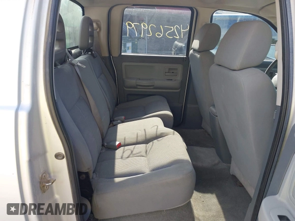 2006 Dodge Dakota SLT with VIN 1D7HW48N56S503261, listed as a IAAI auction lot 42562979 with 200,676 mi miles and . Bid and sale history available at DreamBid. Image 8.