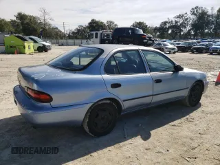 1996 Geo Prizm z VIN 1Y1SK526XTZ020379, wystawiony jako Copart lot #41657375 z przebiegiem 197 763 mil mil oraz Szkody całkowita. Historia ofert i sprzedaży dostępna na DreamBid. Obrazek 3.