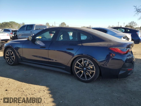 2024 BMW i4 eDrive40 with VIN WBY73AW03RFS35715, listed as a Copart auction lot 87730595 with 10,811 mi miles and Salvage Title. Bid and sale history available at carsss.com. Image 2.