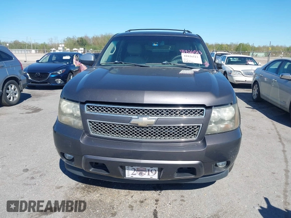 2011 Chevrolet Suburban LT with VIN 1GNSCJE03BR255374, listed as a IAAI auction lot 41826513 with 279,698 mi miles. Bid and sale history available at carsss.com. Image 12.