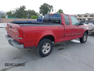 2002 Ford F-150 XL z VIN 1FTRX18W92KE21921, wystawiony jako IAAI lot #42488433 z przebiegiem 151 746 mil mil oraz . Historia ofert i sprzedaży dostępna na DreamBid. Obrazek 4.