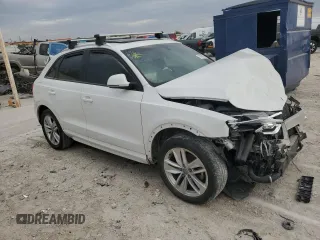 2017 Audi Q3 Premium z VIN WA1BCCFS0HR016968, wystawiony jako Copart lot #79358604 z przebiegiem Nie podano mil oraz Szkody całkowita. Historia ofert i sprzedaży dostępna na DreamBid. Obrazek 4.