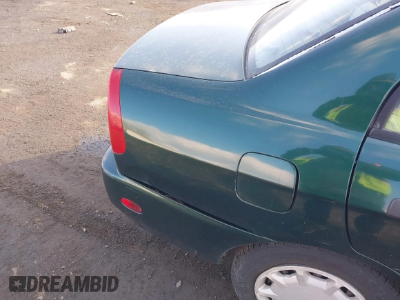 2001 Mitsubishi Mirage ES z VIN JA3AY26C91U041410, wystawiony jako IAAI lot #41360183 z przebiegiem 322 178 mil mil oraz . Historia ofert i sprzedaży dostępna na DreamBid. Obrazek 6.