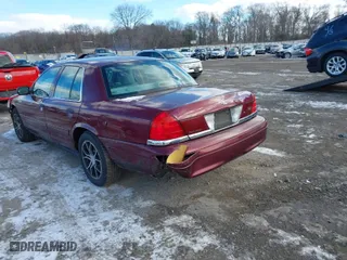 2004 Ford Crown Victoria Standard with VIN 2FAFP73W74X150232, listed as a IAAI auction lot 41277271 with 146,518 mi miles. Bid and sale history available at carsss.com. Image 3.