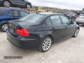 2011 BMW 3 Series 328i xDrive with VIN WBAPK7C50BA816306, listed as a IAAI auction lot 41950040 with 243,166 mi miles. Bid and sale history available at carsss.com. Image 4.