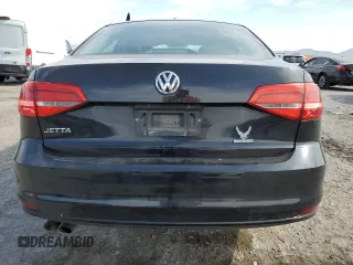 2015 Volkswagen Jetta S with VIN 3VW2K7AJ3FM355363, listed as a Copart auction lot 58516655 with 140,688 mi miles and Salvage title. Bid and sale history available at DreamBid. Image 6.