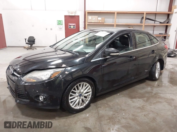 2014 Ford Focus Titanium with VIN 1FADP3J22EL199563, listed as a IAAI auction lot 41450106 with 129,271 mi miles. Bid and sale history available at carsss.com. Image 2.