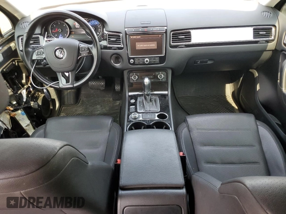 2015 Volkswagen Touareg Lux с VIN WVGEP9BP2FD004595, выставлен на аукционе Copart как лот 59020375 с пробегом 135 319 миль миль и Списание • Salvage title. История ставок и продаж доступна на DreamBid. Изображение 8.