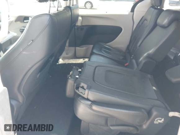 2017 Chrysler Pacifica Touring L with VIN 2C4RC1BG0HR821230, listed as a IAAI auction lot 42158120 with 98,354 mi miles and . Bid and sale history available at DreamBid. Image 8.