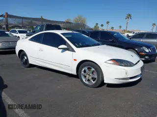 1999 Mercury Cougar z VIN 1ZWFT61L9X5753318, wystawiony jako IAAI lot #41982375 z przebiegiem 136 908 mil mil oraz . Historia ofert i sprzedaży dostępna na DreamBid. Obrazek 1.