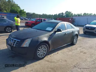 2012 Cadillac CTS z VIN 1G6DA5E51C0152943, wystawiony jako IAAI lot #42116892 z przebiegiem 176 049 mil mil oraz . Historia ofert i sprzedaży dostępna na DreamBid. Obrazek 2.