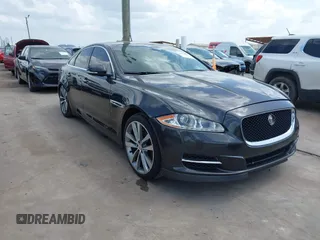 2015 Jaguar XJ with VIN SAJWA3HT3FMV86221, listed as a IAAI auction lot 42628203 with 125,951 mi miles and . Bid and sale history available at DreamBid. Image 1.