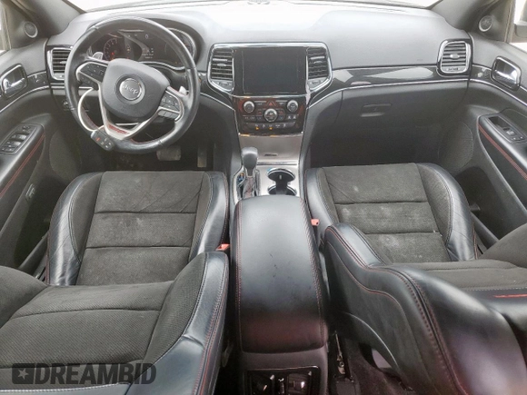 2019 Jeep Grand Cherokee Trailhawk with VIN 1C4RJFLG8KC613582, listed as a Copart auction lot 62901405 with 136,809 mi miles and Salvage title. Bid and sale history available at DreamBid. Image 8.