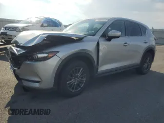 2020 Mazda CX-5 Touring with VIN JM3KFACMXL0766115, listed as a Copart auction lot 78695344 with 71,850 mi miles and Salvage Title. Bid and sale history available at carsss.com. Image 1.