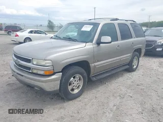 2001 Chevrolet Tahoe LS z VIN 1GNEC13T11J107893, wystawiony jako IAAI lot #42261213 z przebiegiem 338 454 mil mil oraz . Historia ofert i sprzedaży dostępna na DreamBid. Obrazek 2.