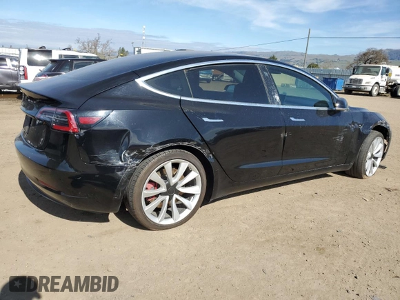 2019 Tesla Model 3 Mid Range with VIN 5YJ3E1EAXKF311719, listed as a Copart auction lot 44570825 with 143,034 mi miles and Salvage Title. Bid and sale history available at carsss.com. Image 3.