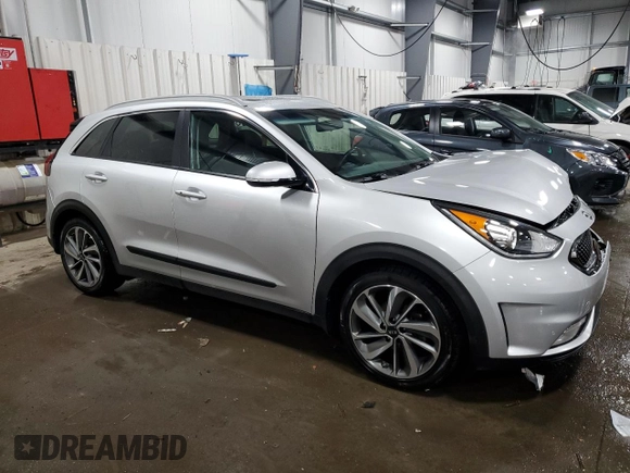 2017 Kia Niro Touring with VIN KNDCE3LC3H5094332, listed as a Copart auction lot 47012995 with 115,257 mi miles and Salvage Title. Bid and sale history available at carsss.com. Image 4.